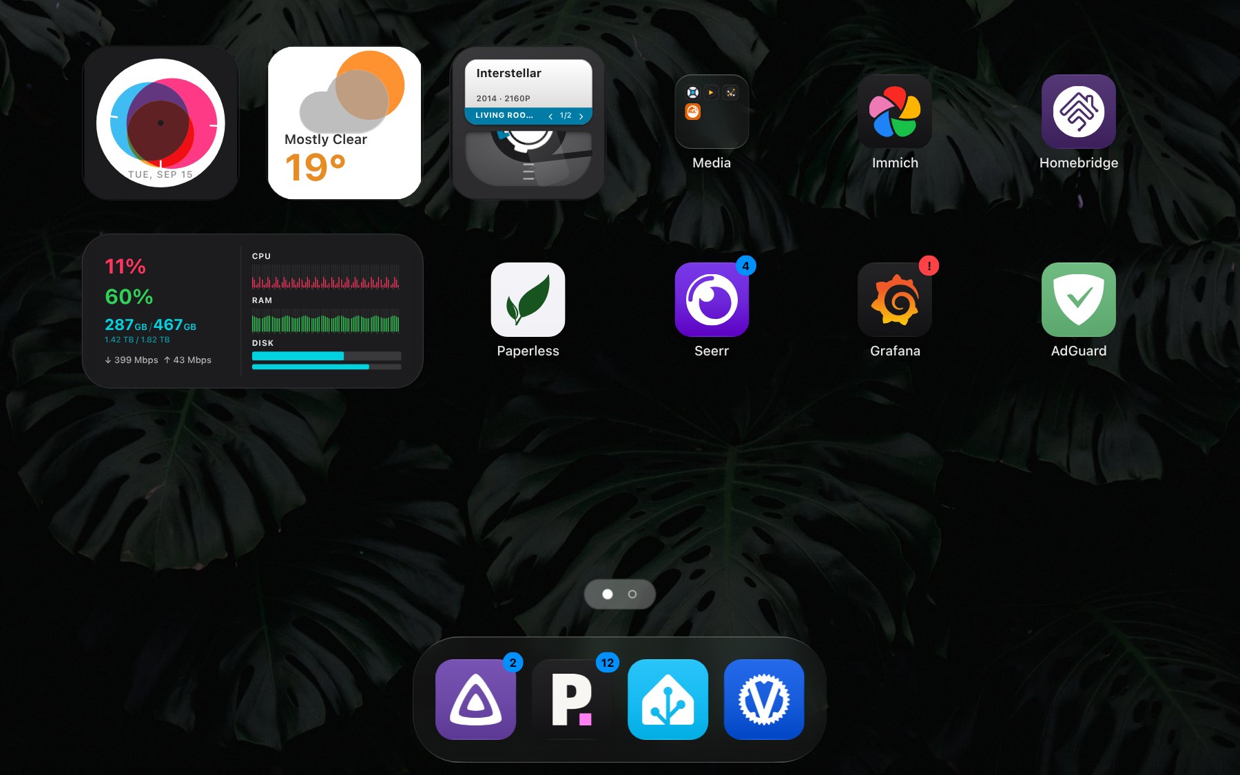 The Stackyard dashboard, with widgets, app tiles, a folder and the dock.